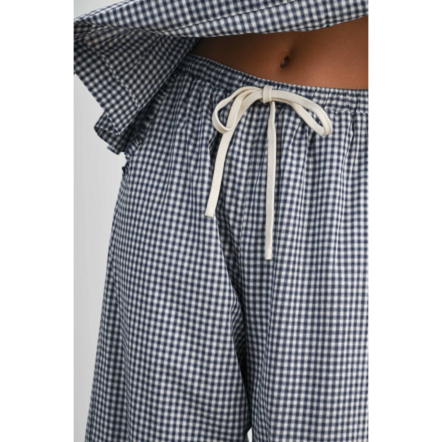 Striped Ruffle Hem Cropped Pants