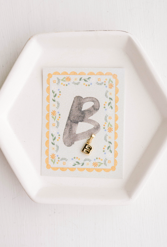 B - Letter Charm