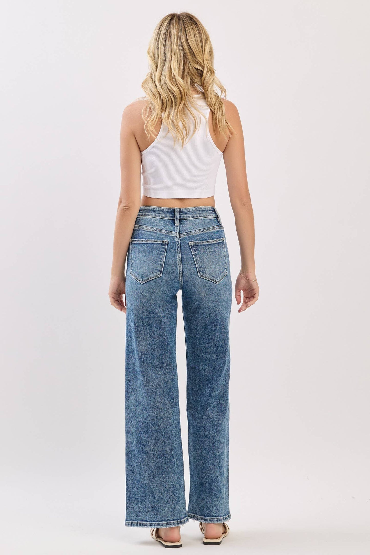 HIGH RISE SLIM WIDE LEG W/ DESTROYED HEM JEANS